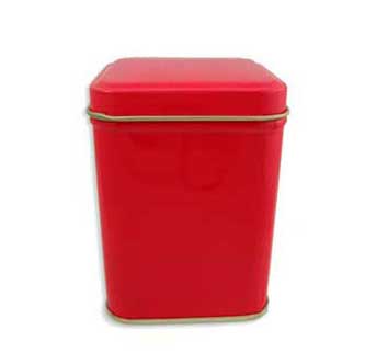 small red tea tin